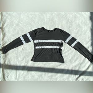 Striped black long sleeve shirt.